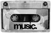 A grey cassette tape with a label that says music.